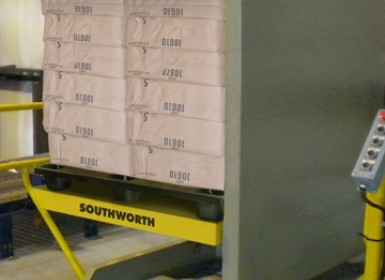 Pallet Rotator inverts a full pallet load 180˚ in just seconds