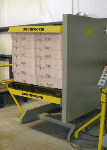 Pallet Rotator inverts a full pallet load 180˚ in just seconds