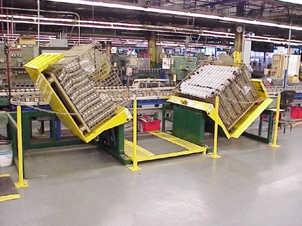 Floor Height Container Tilter in Side Entry Configuration