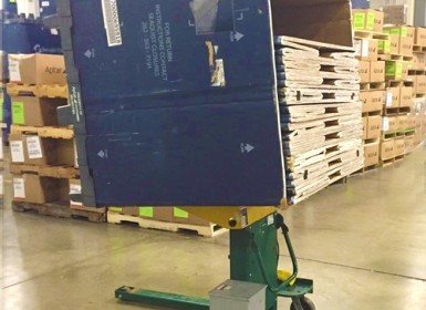 Portable Container Tilter forks up