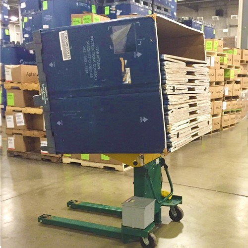 Portable Container Tilter forks up
