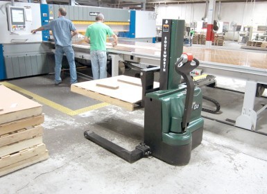 Fully Powered Compact Stacker in Woodworking Application
